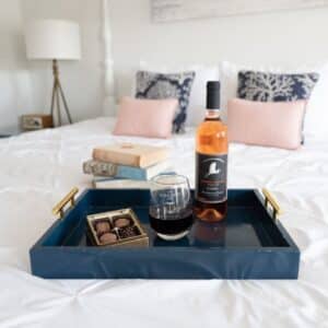 Wine and chocolates waiting for you upon arrival on hotel bed in Mystic