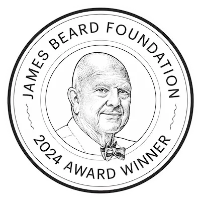Official 2024 James Beard Foundation Award Winner circular logo featuring a portrait of James Beard.