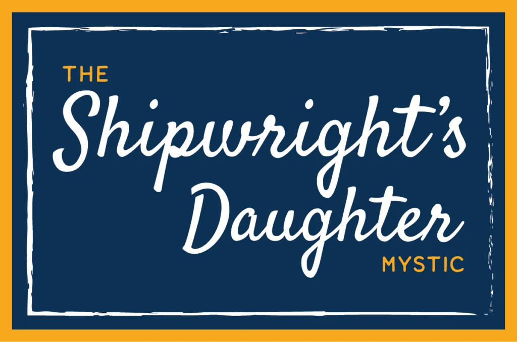 Logo for The Shipwright's Daughter restaurant in Mystic, featuring white cursive text on a dark blue background.